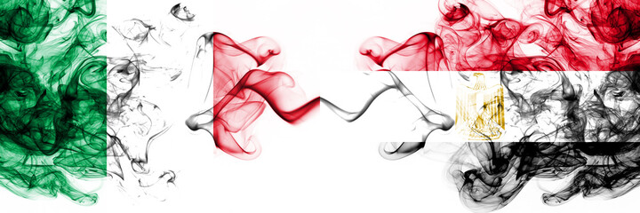 Italy vs Egypt, Egyptian smoky mystic flags placed side by side. Thick colored silky abstract smoke flags