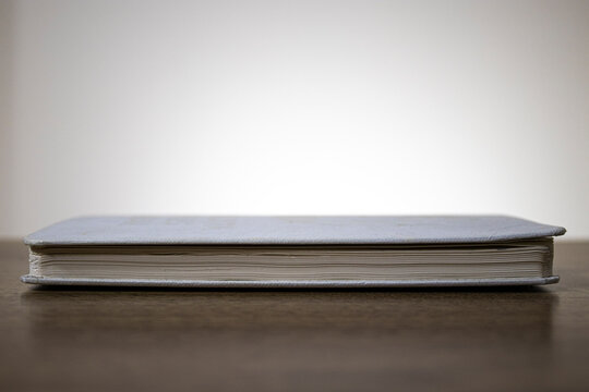 Photo of the closed diary taken in side profile.
