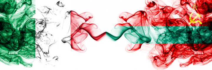 Italy vs Transnistria smoky mystic flags placed side by side. Thick colored silky abstract smoke flags