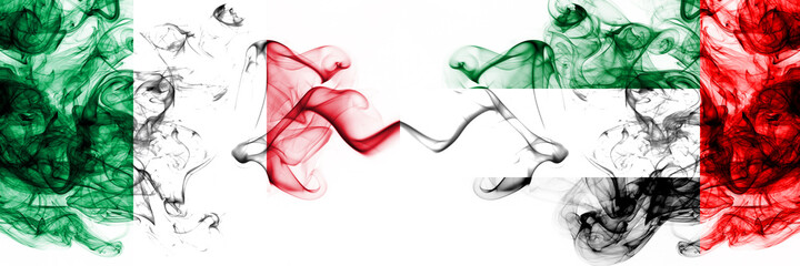Italy vs United Arab Emirates, Emirati smoky mystic flags placed side by side. Thick colored silky abstract smoke flags