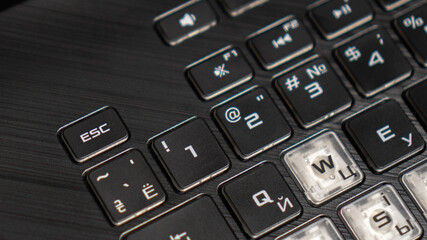 ESC button on keyboard. Ukrainian language and Cyrillic keyboard. Escape key on a keyboard, esc key