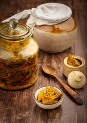 Homemade raw mango pickle, mango pickle is a traditional Indian condiment made with raw mangoes, spices and oil.