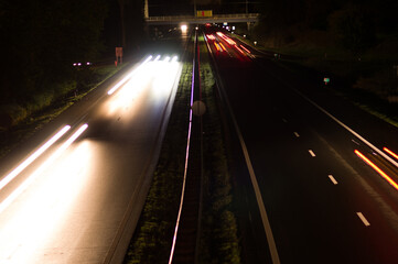 Highway at night with traffic blurred by motion in arnhem, Netherlands