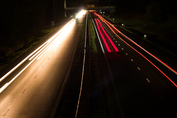 Highway at night with traffic blurred by motion in arnhem, Netherlands