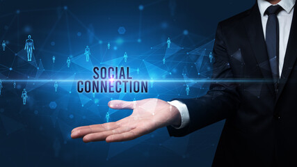 Elegant hand holding SOCIAL CONNECTION inscription, social networking concept