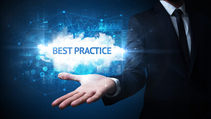 Hand of Businessman holding BEST PRACTICE inscription, successful business concept