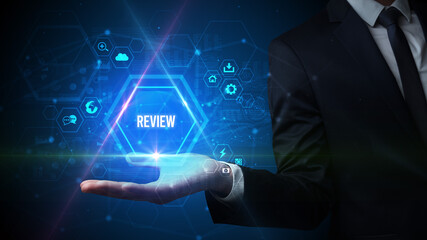 Man hand holding REVIEW inscription, social media concept