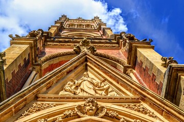 Obraz premium Church, details of architecture and blue sky in Chemnitz. St. Peter's Church, Chemnitz (Petrikirche) Germany. During sunny day with blue sky.