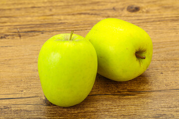 Two ripe green sweet apples