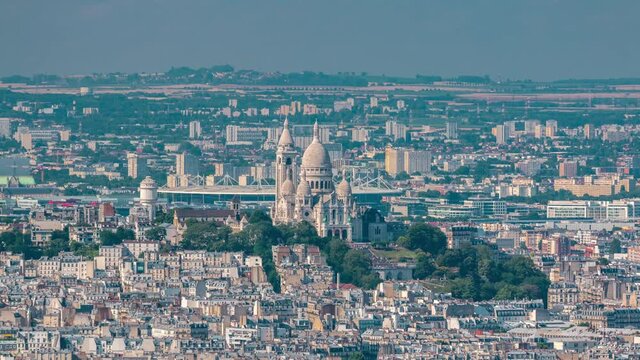 Top view of Paris skyline from above timelapse. Main landmarks of european megapolis with Sacre coeur basilica. Bird-eye view from observation deck of Montparnasse tower. Paris, France