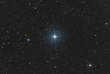 Closeup of the star γ Cas in Cassiopeia constellation, with also the nebula IC 63 at the top...