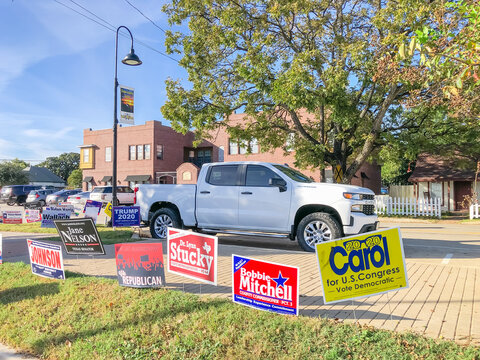 Row Of Election Poster And Campaign Yard Sign Near An Early Voting Location In Main Street Roanoke, Texas