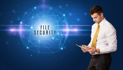Businessman thinking about security solutions with FILE SECURITY inscription
