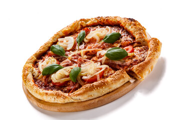 Pizza with ham, mozzarella, champignon, tomatoes and onion on white background
