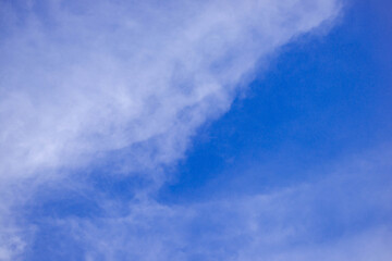 Background picture of blue sky and thin white clouds