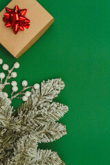 Fototapeta na wymiar Christmas composition. Christmas gift, pine cones, thuja branches and gypsophila flowers. Flat lay, top view, copy space