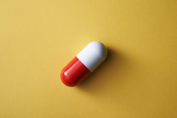 medicine pill on the yellow background