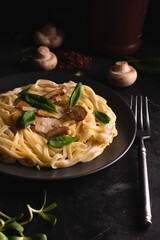 Italian pasta with creamy sauce and mushrooms