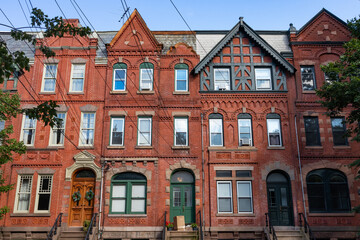 Fototapeta na wymiar Row of Beautiful Old Brick Neighborhood Homes in Hamilton Park of Jersey City