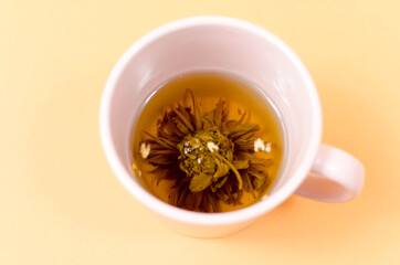Cup with tea on the table
