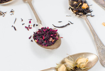 spoon with tea on the table