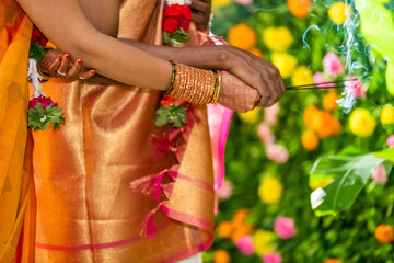 Fototapeta na wymiar Orange silk saree , bride , traditional Hindu wedding , India