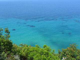 Fototapeta na wymiar The turquoise ocean and paradise beaches of the greek island of Samos in the Aegean Sea, Greece