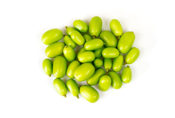 Medicinal neem fruits isolated on white background.