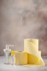 Close up of toilet paper and desinficant. Panic buying (Hamsterkäufe) because of coronavirus