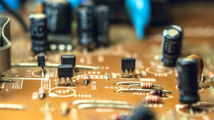 Fototapeta na wymiar Electrical components on tv circuit board,macro close-up