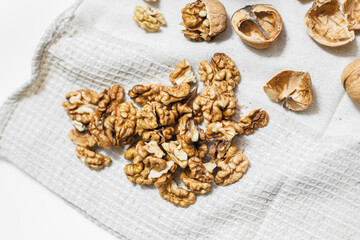walnuts on a white wooden background
