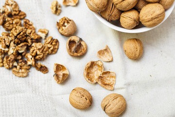 walnuts on a white wooden background