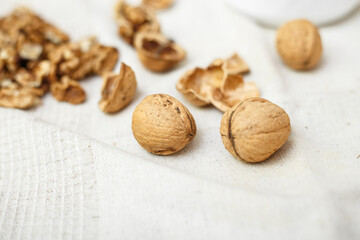 walnuts on a white wooden background