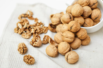 walnuts on a white wooden background