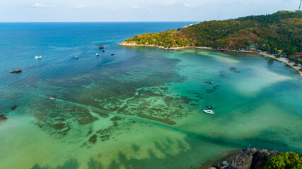 Aerial view drone uav top down birds eye view blue water and coral reef at Koh Tao Thailand by Drone High angle view.