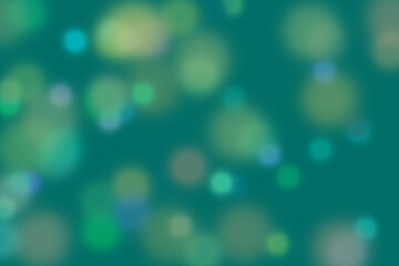 Blurred teal green bokeh lights, party background