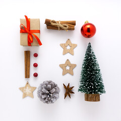 Creative concept holiday celebration photo of christmas tree toys balls decoration on white background.