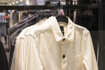 T-Shirt of man for sales on hangers at super market  Thailand