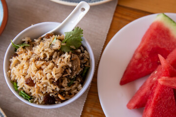 
sautéed rice with vegetables and nuts