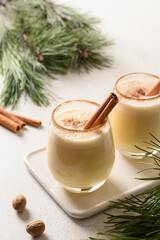 Christmas eggnog with nutmeg and cinnamon. Close up.