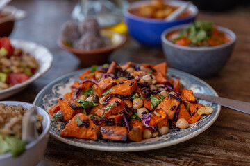sautéed sweet potato dish with vegetables and chickpeas