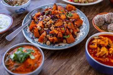 sautéed sweet potato dish with vegetables and chickpeas