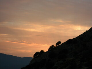 Sunset over the beautiful beaches of the Greek island of Samos in the Aegean Sea, Greece