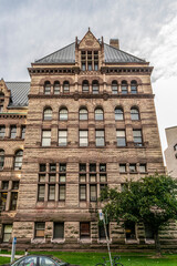 Toronto's Old City Hall (1899) was home to its city council from 1899 to 1966 and remains one of the city's most prominent structures. Toronto, Ontario, Canada.