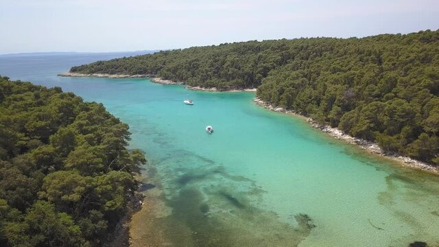 Aerial view on the beautiful bay with yacht on Rab island in Croatia.