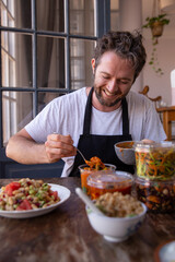 Chef preparing healthy food to take away smiling