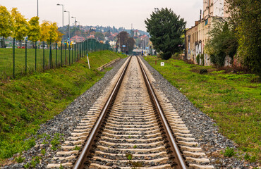 Fototapeta na wymiar Railway empty crossing the city of Prague in the Czech Republic in a metropolitan area