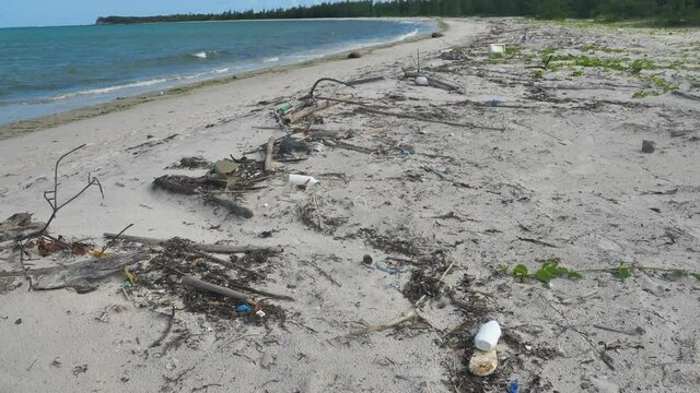 Plastic Bottles and Other Garbage Pollution Washed Up On Beach, Madagascar