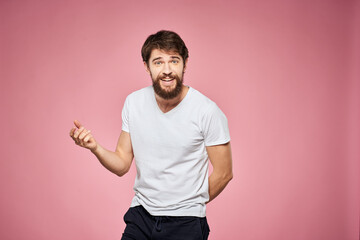 cute bearded men white t-shirt studio pink isolated background