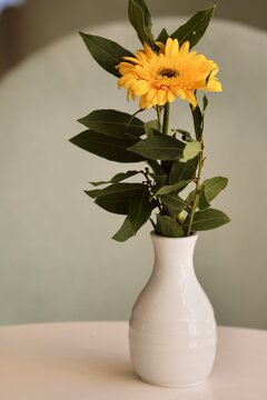 vase with yellow flowers in the vase